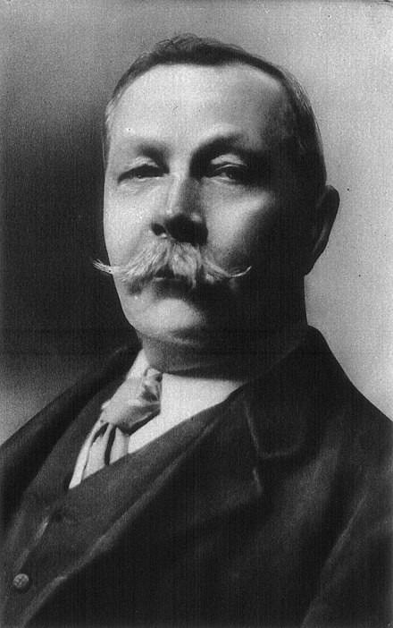 Black and white photograph of Sir Arthur Conan Doyle with a large moustache